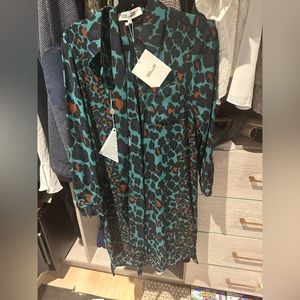 Diane Von furstenberg wrap dress. NEVER WORN with tags. Size small.